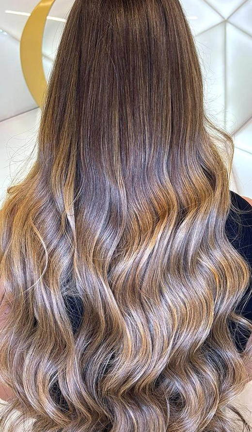 Balayage blonde after extensions at PhiStudio Dubai