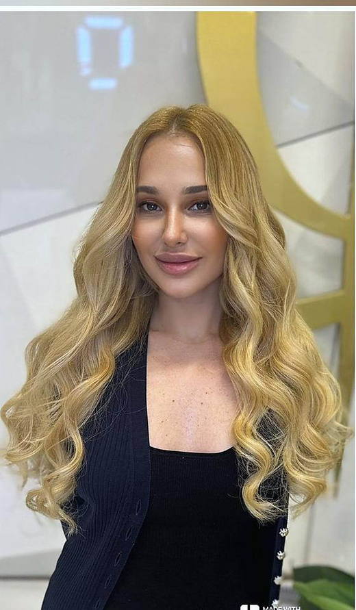 Blonde, front-on after extensions at PhiStudio Dubai