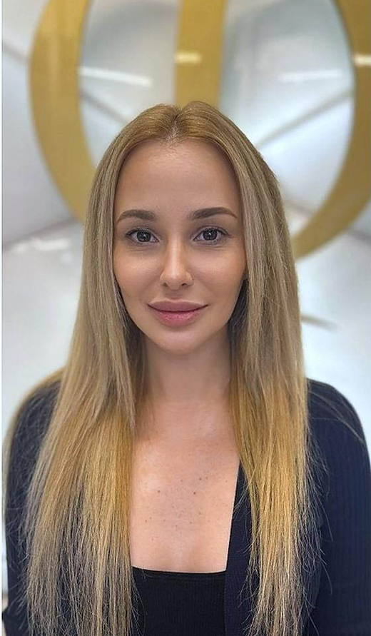 Blonde, front-on before extensions at PhiStudio Dubai
