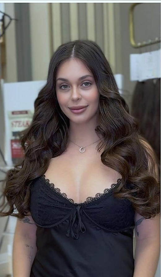 Brunette, front-on after extensions at PhiStudio Dubai