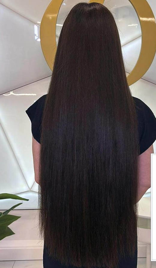 Long brunette after extensions at PhiStudio Dubai