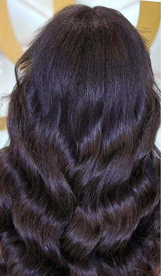 Curls to waves after extensions at PhiStudio Dubai