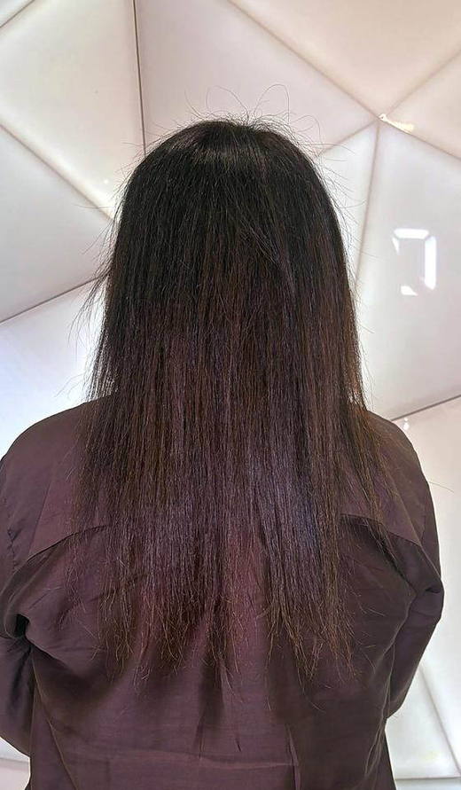 Dark brunette before extensions at PhiStudio Dubai