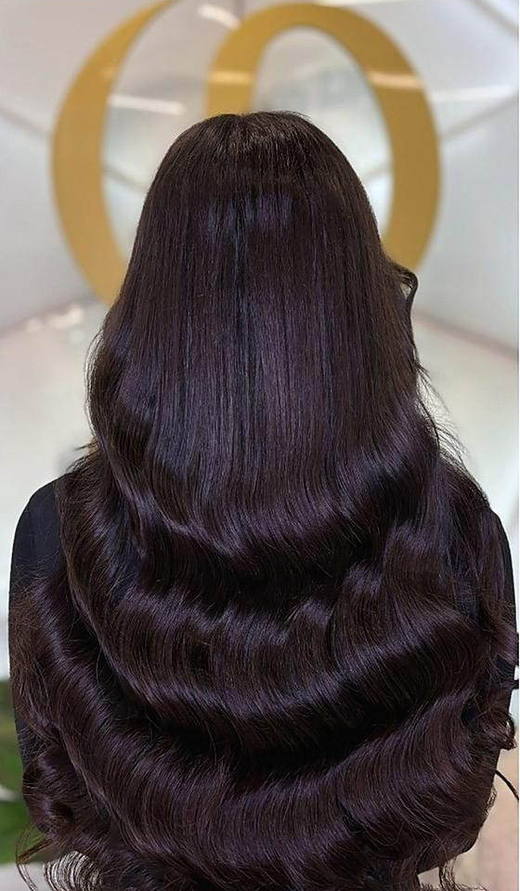 Dark, glossy length after extensions at PhiStudio Dubai