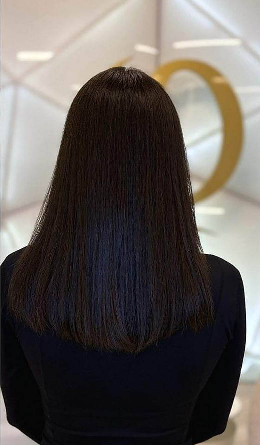 Dark, glossy length before extensions at PhiStudio Dubai