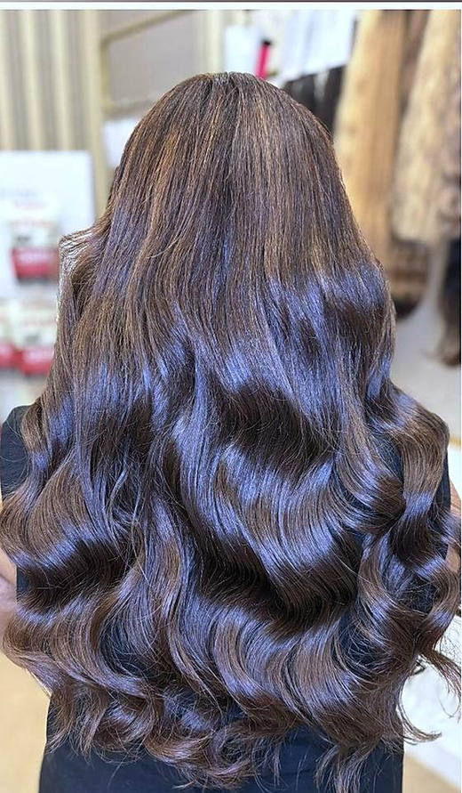 Warm brown length after extensions at PhiStudio Dubai